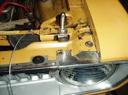 Attached picture Duster hood pins.jpg